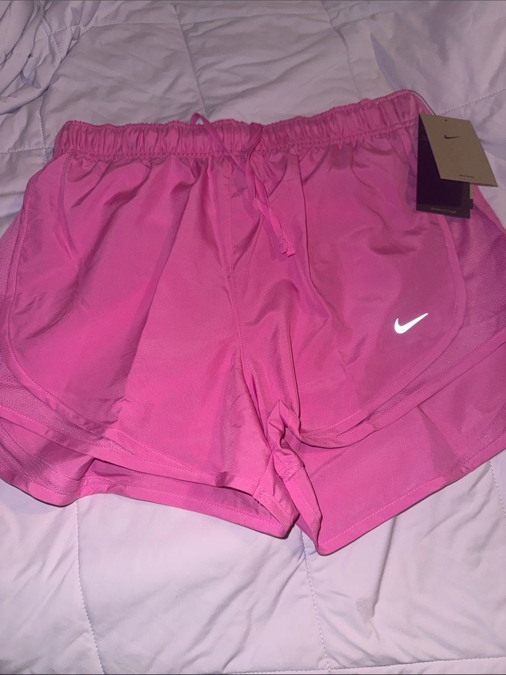 Nike Women's Bright Pink Athletic Shorts with Reflective Swoosh